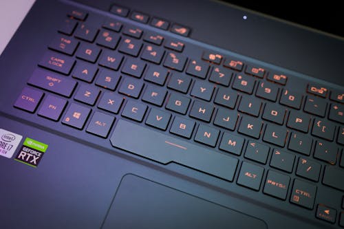 Black Laptop Keyboard in Close Up Photography
