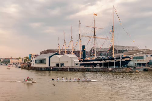 People Rowing near the Bristol Harbour