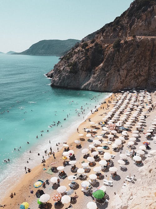 Free People on Beach Stock Photo