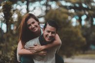 Happy couple having fun in park
