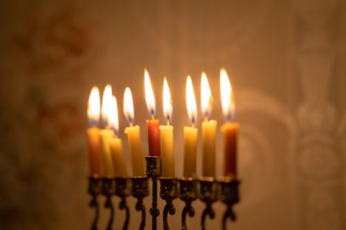 Free Lighted Candles on Black Metal Candle Holder Stock Photo