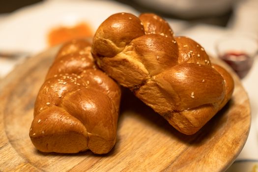 Brown Loaf Breads on Wooden Plate