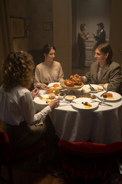 People Having Dinner And Celebrating Hanukkah