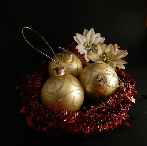 Gold Baubles on Red and White Flower Ornaments