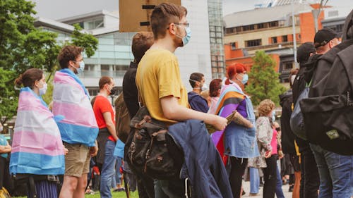 Group of People Wearing Face Mask Standing on the Street