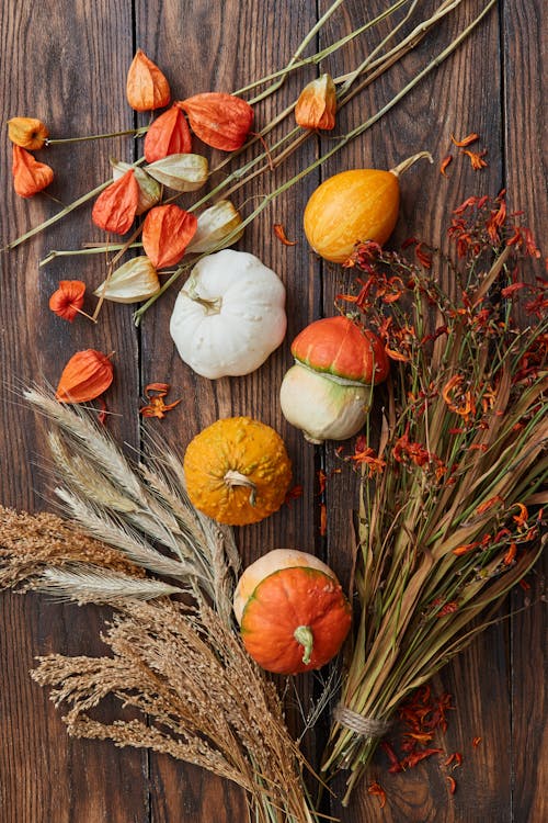 Pumpkins on the Wooden Table