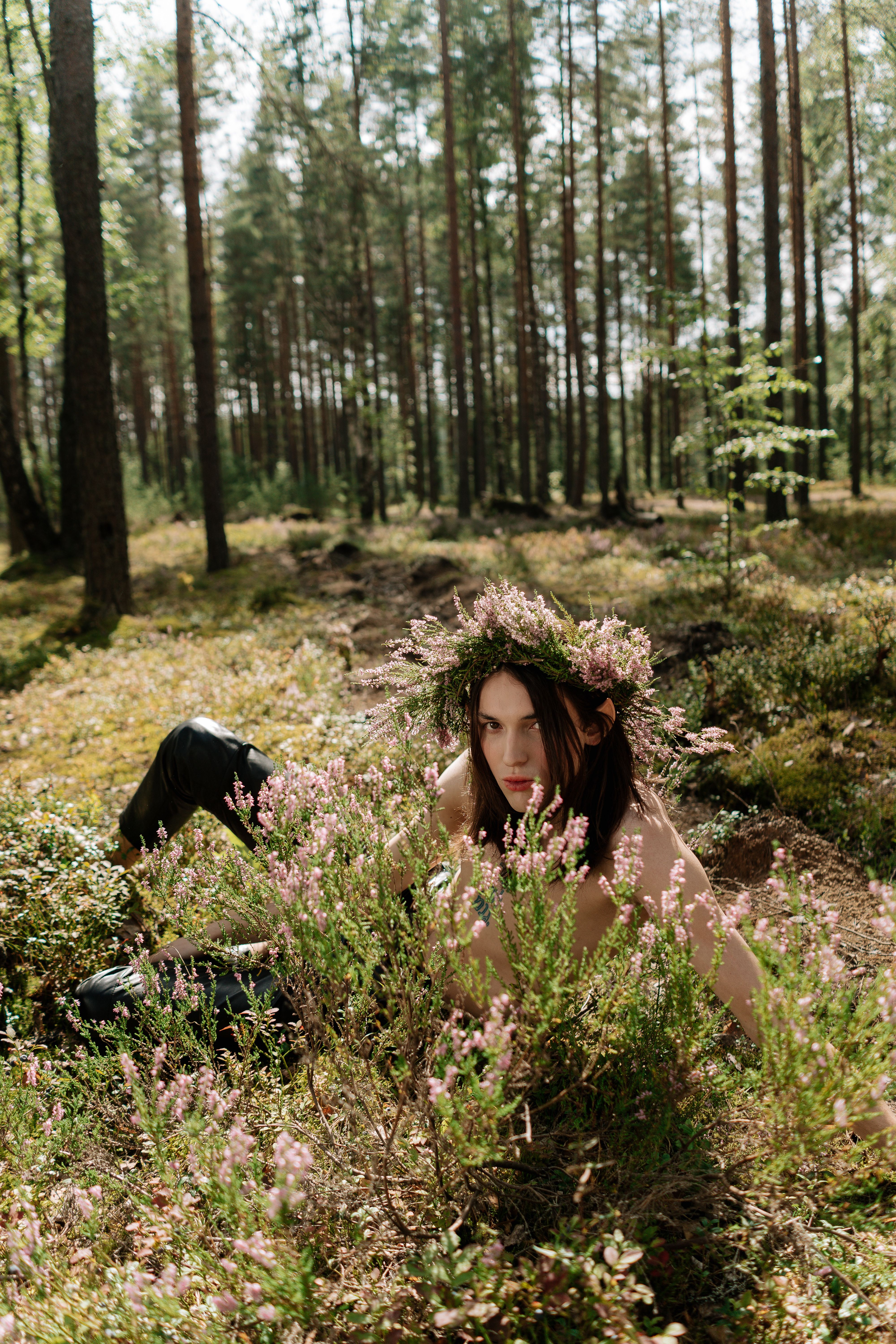 Explore the serene beauty of nature with an enchanting portrait in a lush forest.
