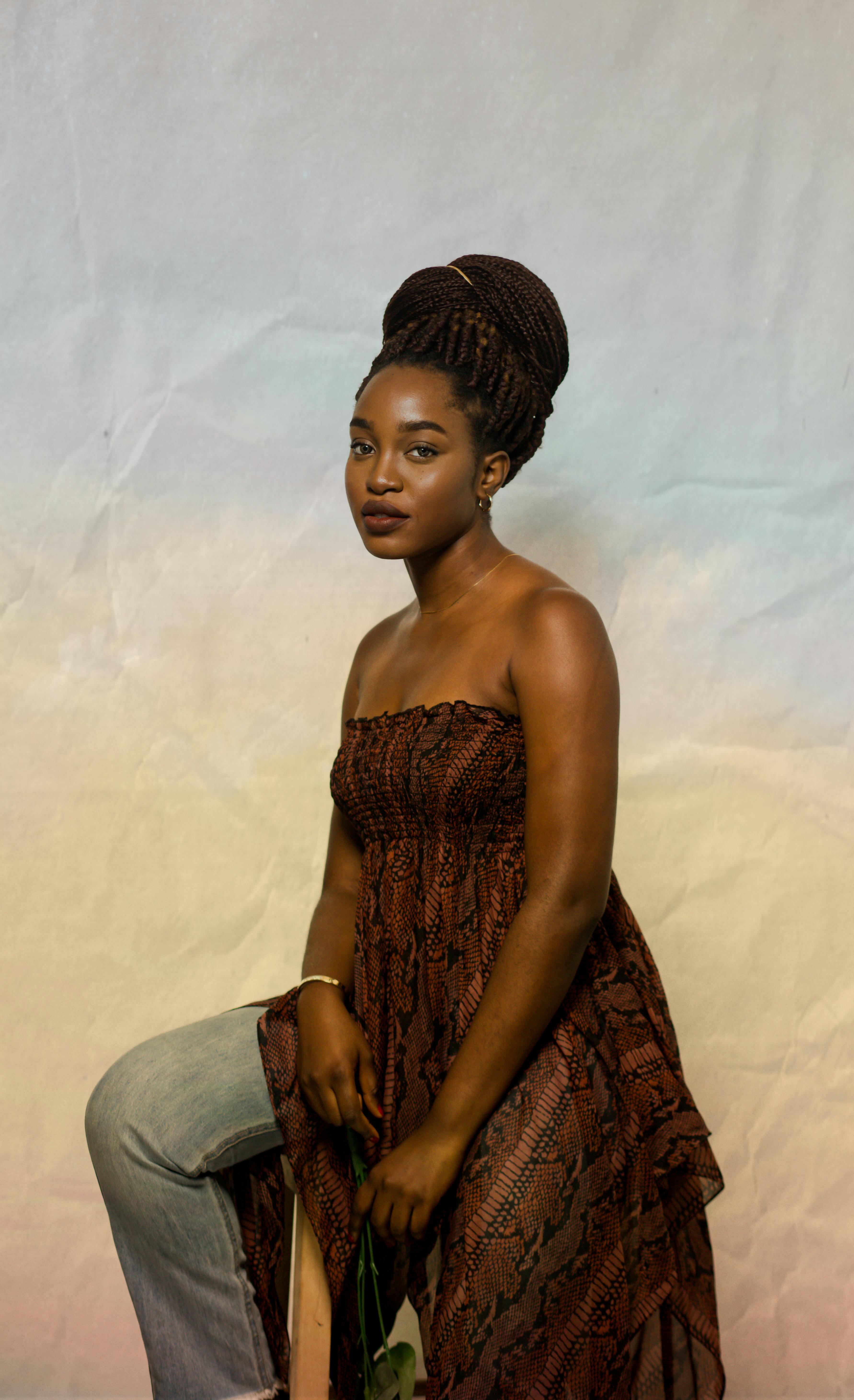 Stylish black woman on colorful background · Free Stock Photo