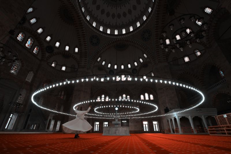 A whirling dervish dances under ornate mosque lights, creating a serene ambiance.