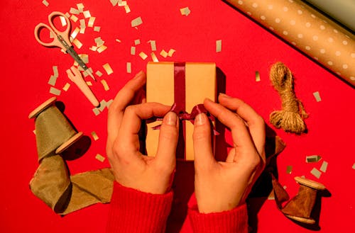 A Person Holding a Gift Box