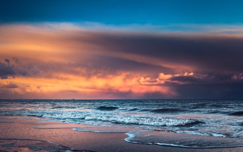 Free Vivid seascape at sunset captured at the serene shores of Gdańsk, Poland. Stock Photo