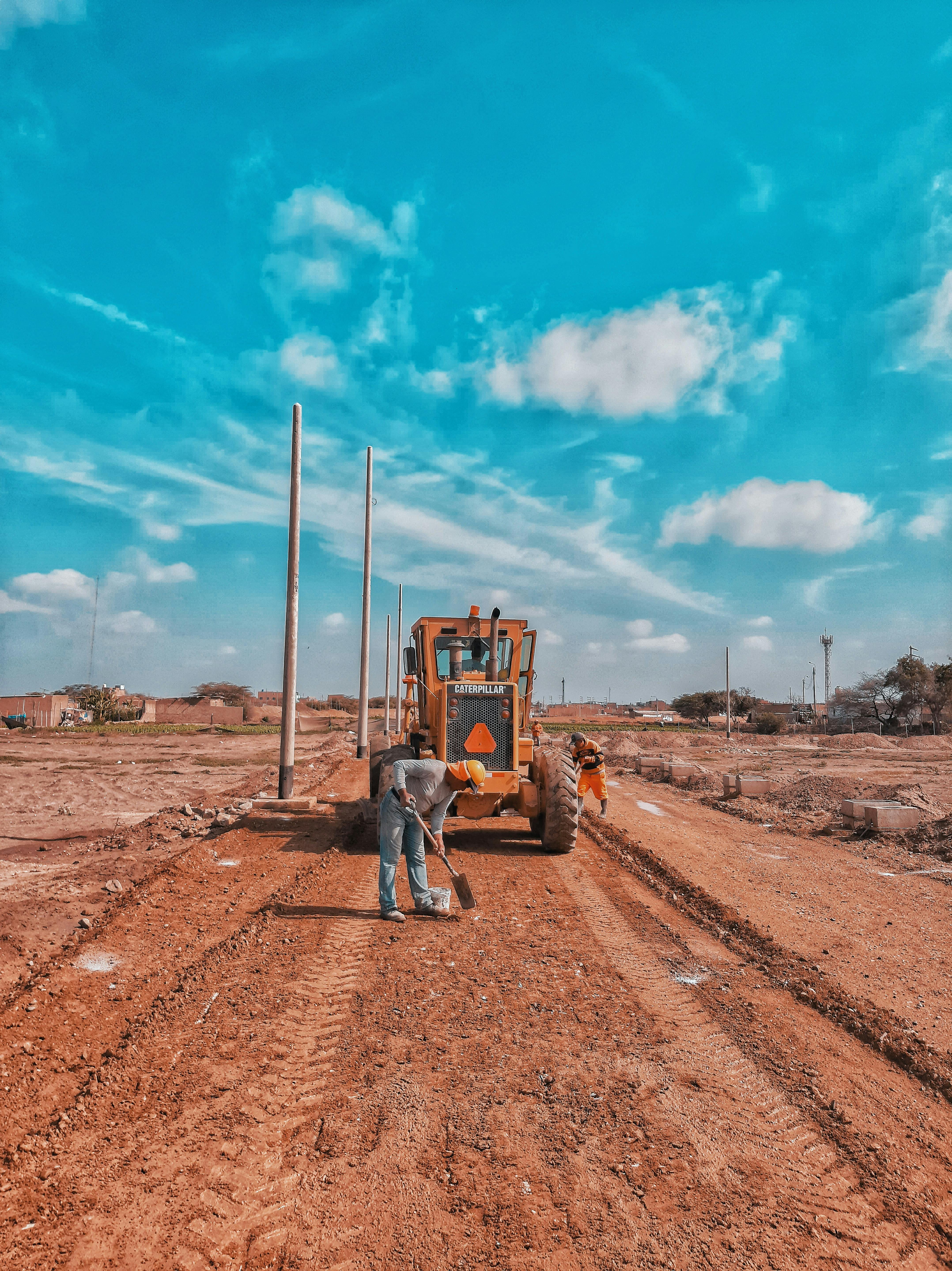 a man holding a shovel