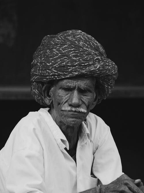 Monochrome Photo of an Elderly Man Wearing a Turban