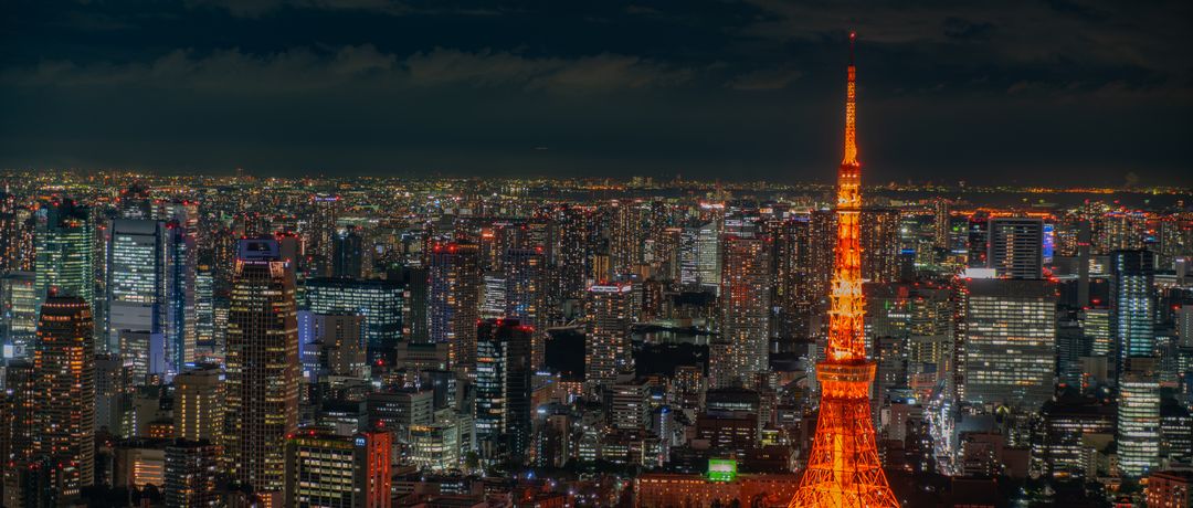 A stunning aerial night view of Tokyo featuring the illuminated Tokyo Tower and bustling cityscape., Tokyo, Japan, stay connected here with a travel eSIM