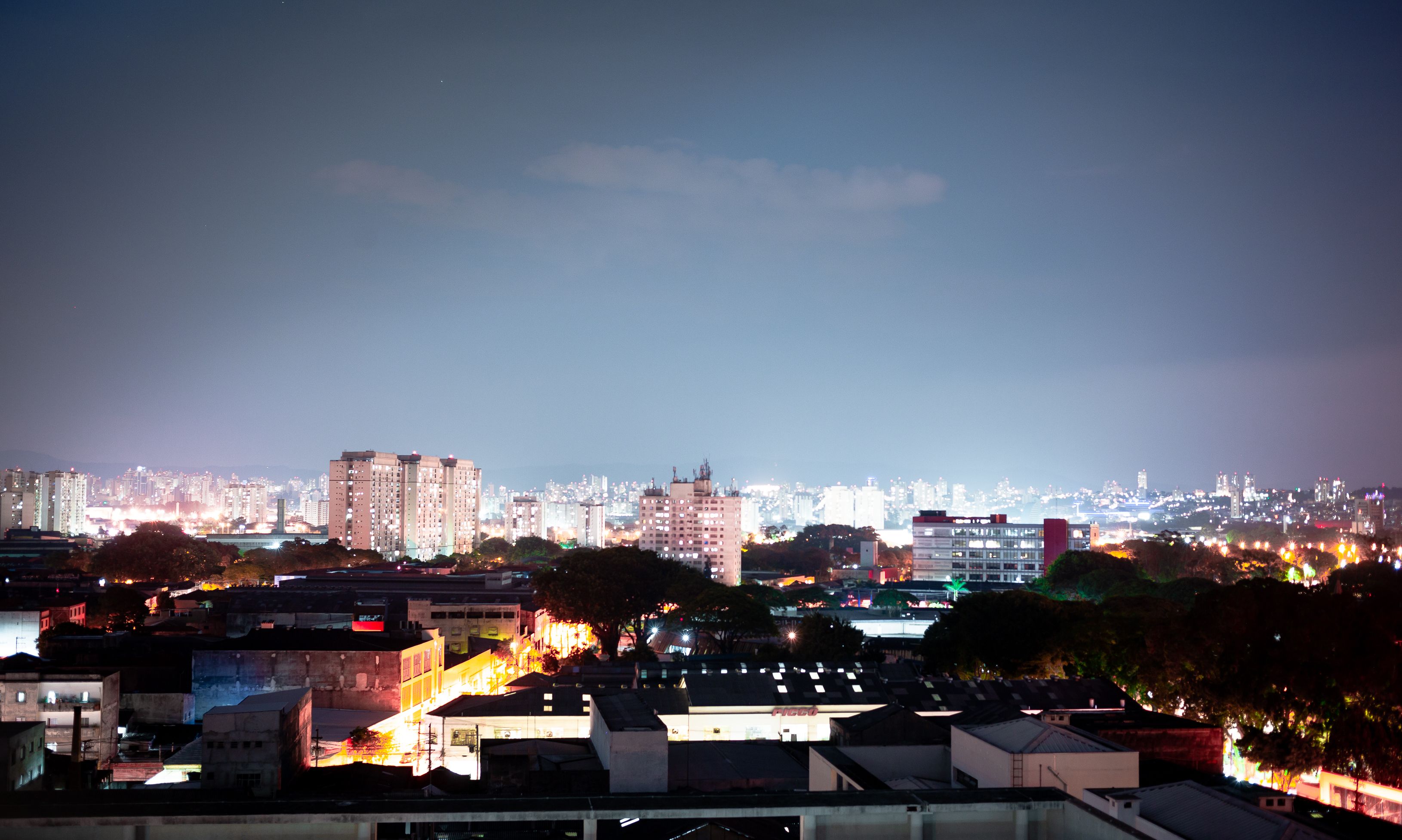 City Buildings During Night Time · Free Stock Photo