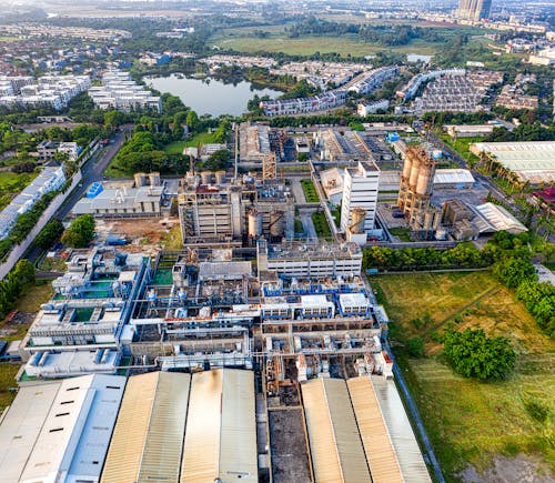 Cityscape of industrial town with factory