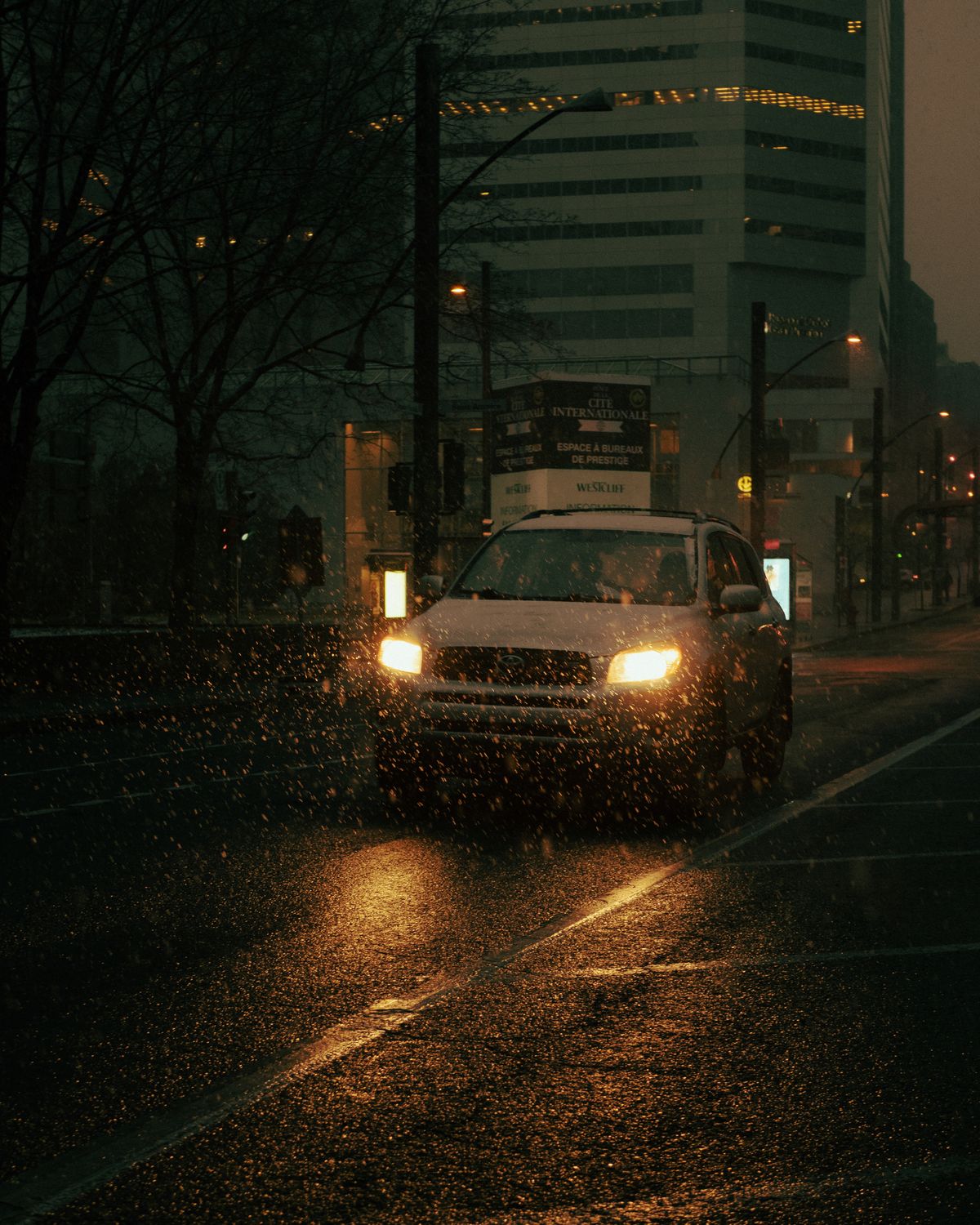 Driving on the Road at a Rainy Night · Free Stock Photo