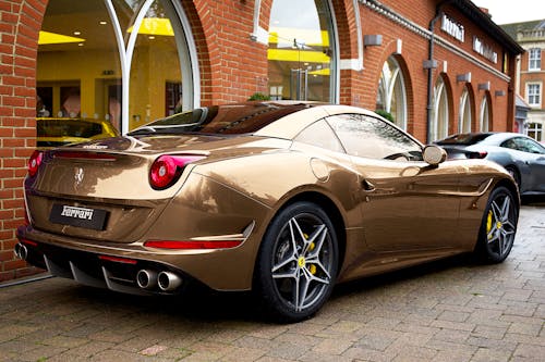 Free A Ferrari Sports Car Parked Outside Stock Photo