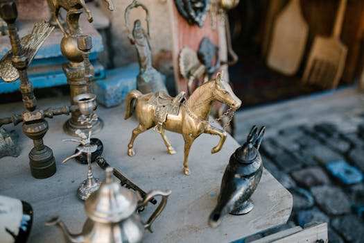 High angle many copper and metal oriental souvenirs arranged on stall in local street market