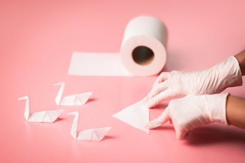 Free A Person Holding a Tissue Paper Stock Photo