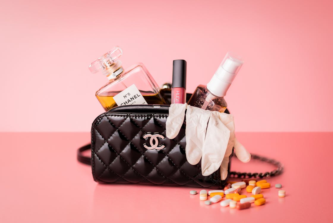 Black Chanel Bag on a Pink Surface · Free Stock Photo