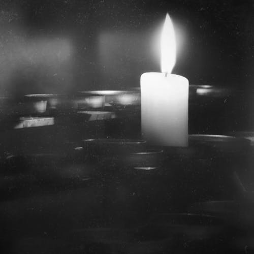 Free Grayscale Photo of a Burning Candle Stock Photo