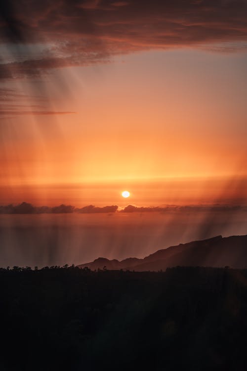 Silhouette of Mountains during Beautiful Sunset