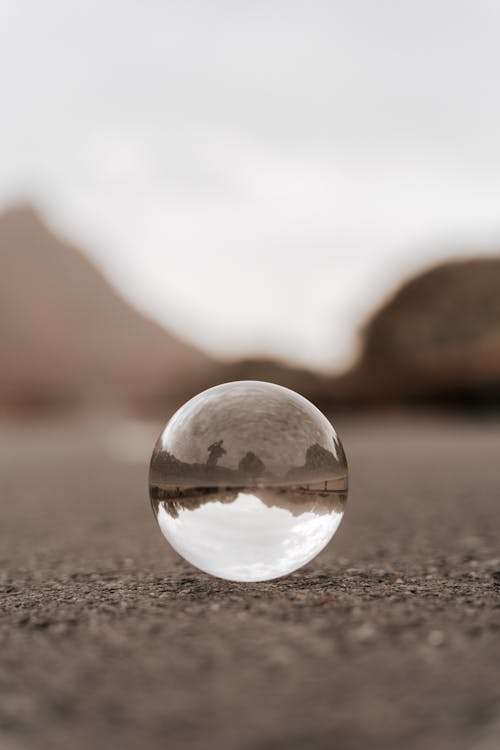 Free Clear Glass Ball on the Ground Stock Photo