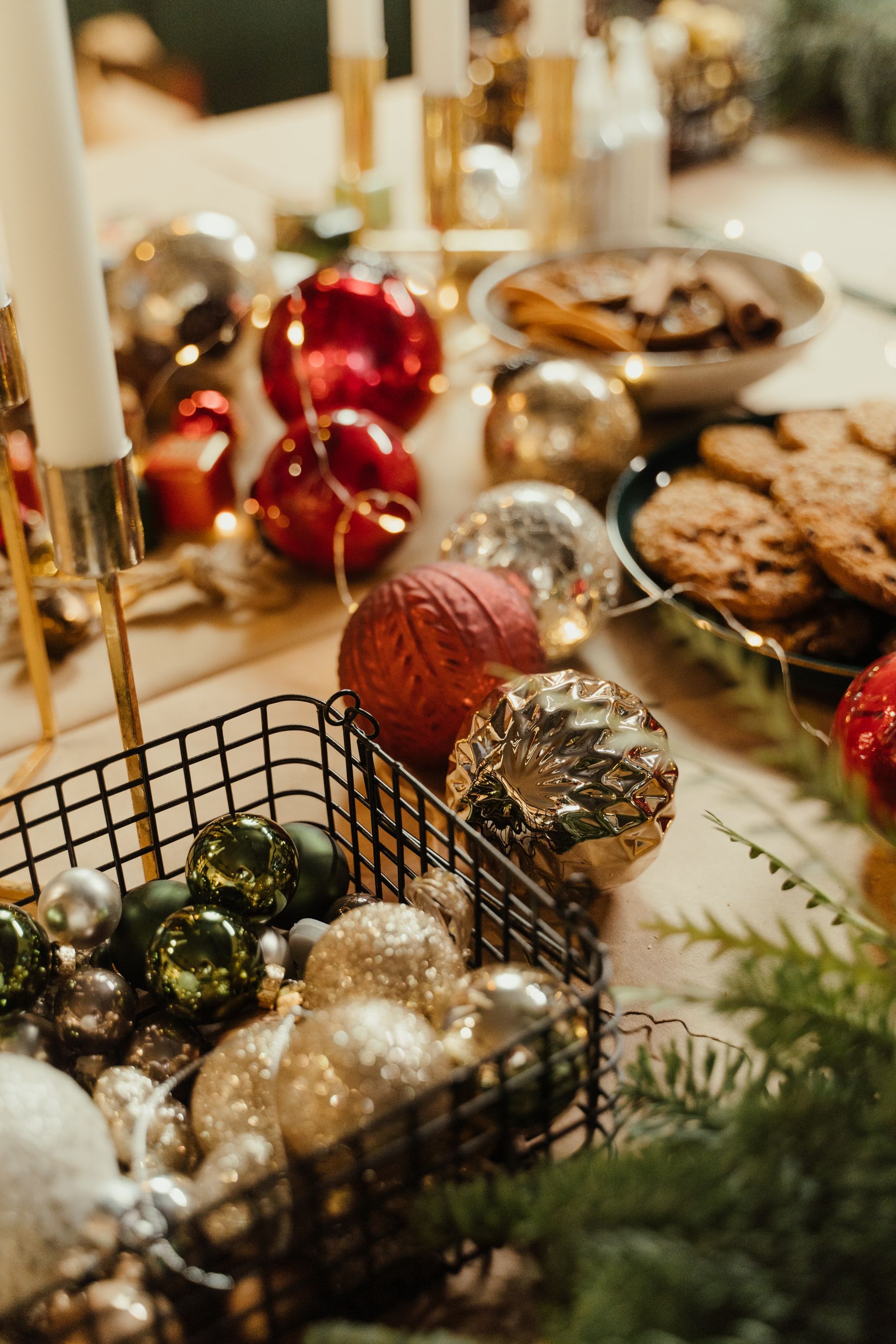 Festive holiday table with seasonal decorations and ornaments