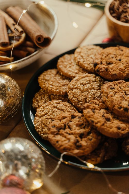 Free Delicious cookies with cinnamon sticks and festive decor. Perfect for the holiday season. Stock Photo