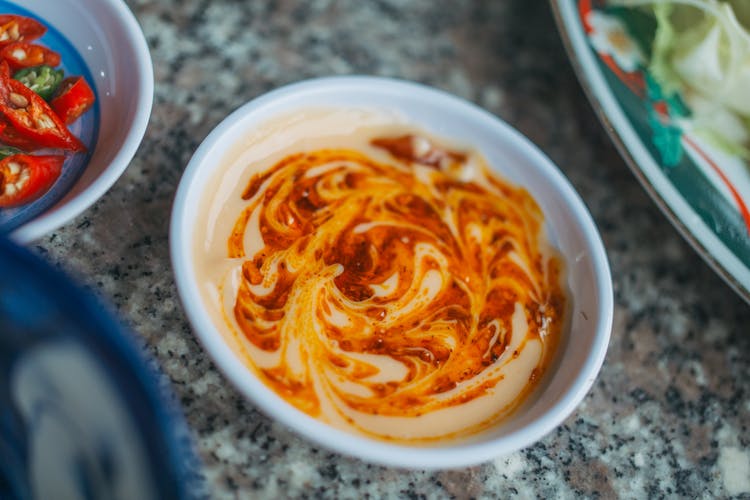 Red Dipping Sauce On A Ramekin On Close-up Photography