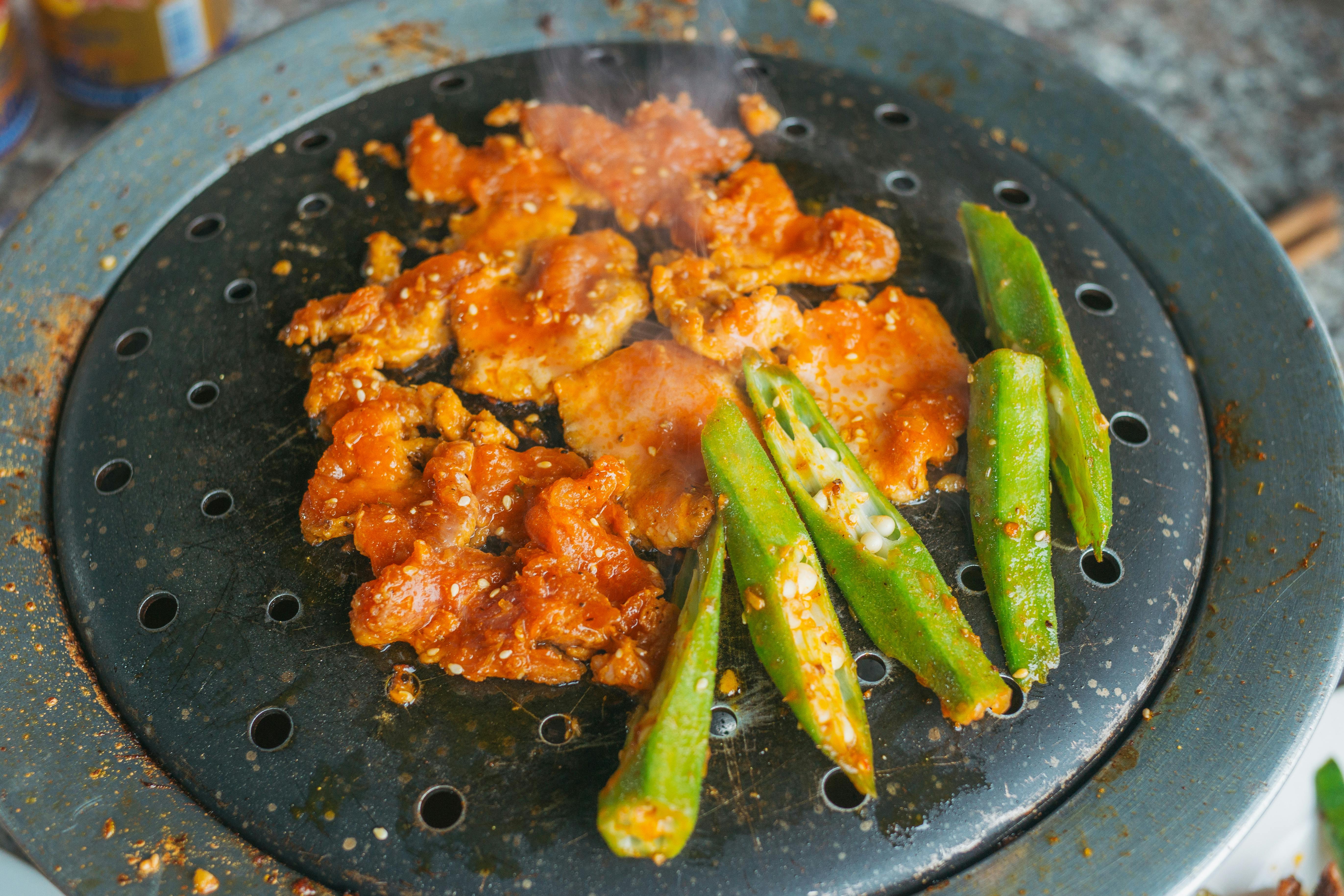 Marinated Pork and Slices of Okra on a Griller · Free Stock Photo