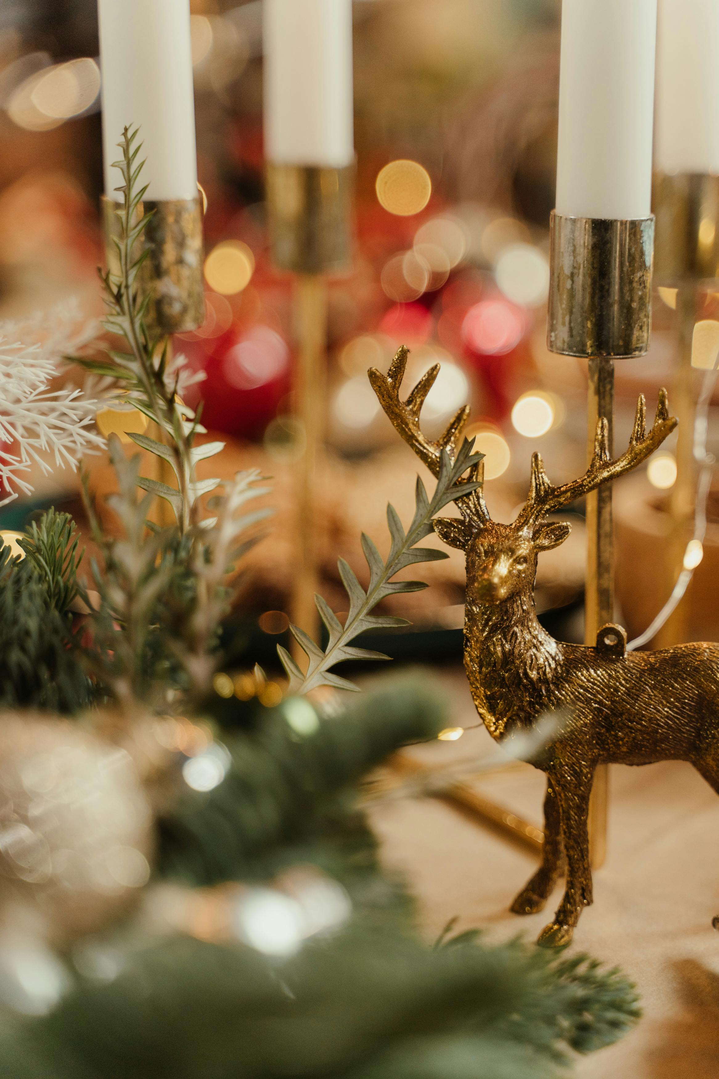 brown deer figurine near a candle stand