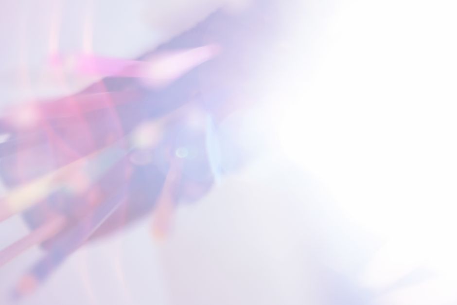 A vibrant abstract image with pastel colors and light effects creates a dreamy atmosphere.