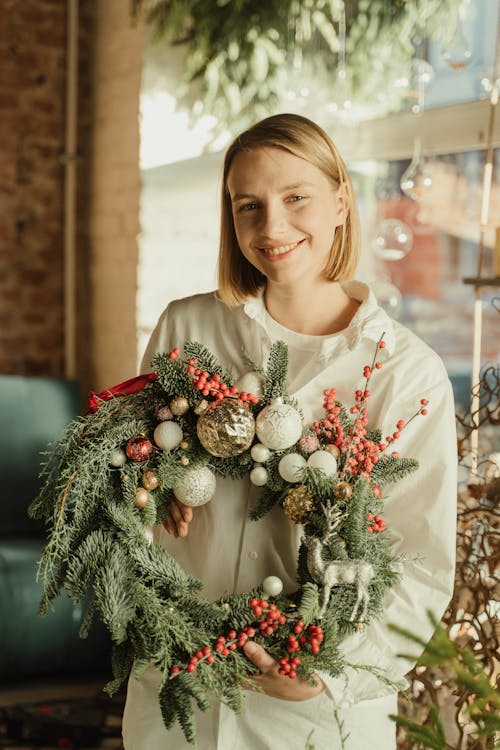 Woman Holding a Wreath
