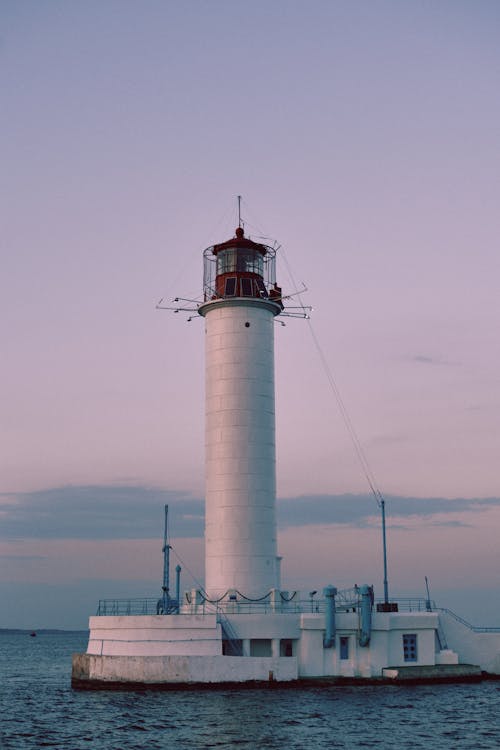 White Lighthouse Under White Sky