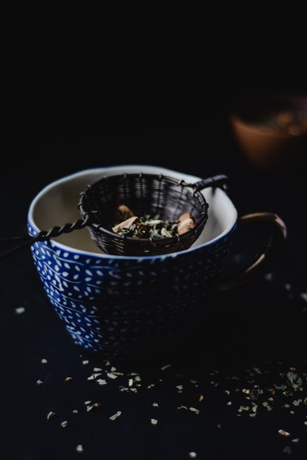 White and Blue Ceramic Teacup