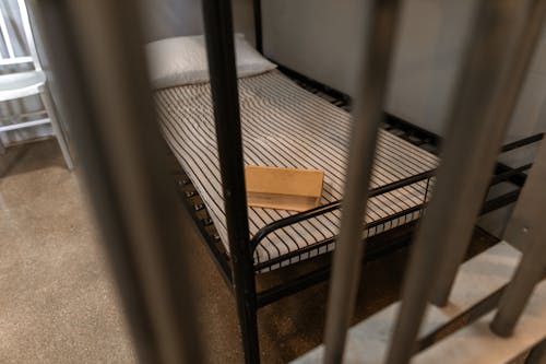 Free Brown Wooden Box on a Striped Foam Mattress Stock Photo