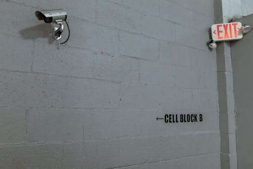Free Wall Mounted Surveillance Camera on a Wall Stock Photo