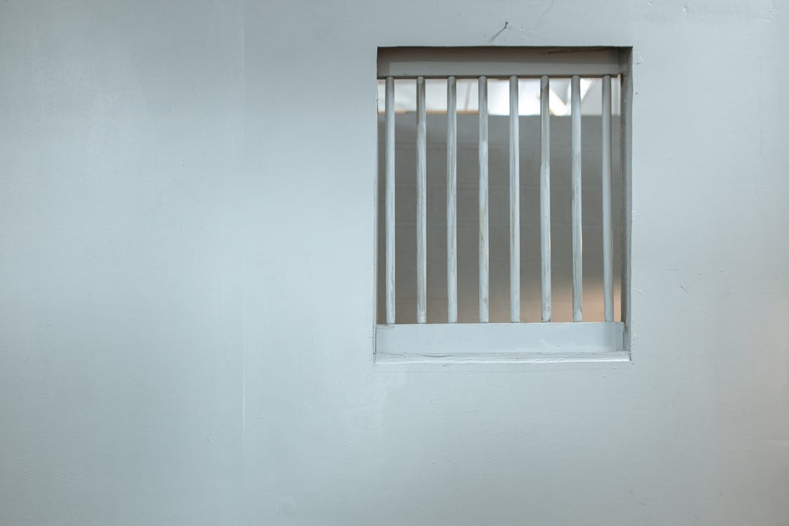 Free White Steel Bars Window on a Wall Stock Photo