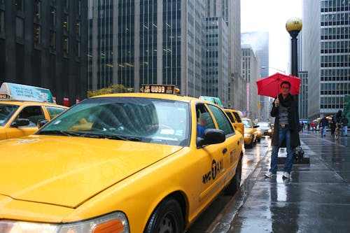 Free Yellow Taxi Cab on the Street Stock Photo