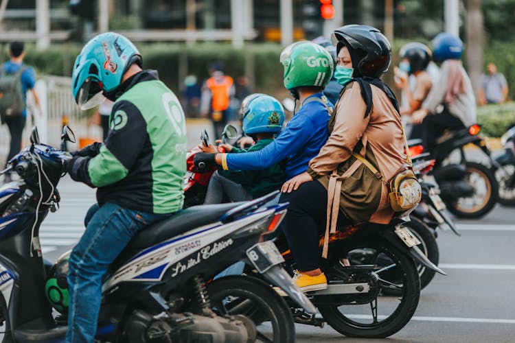 Family On A Motorcycle In A Street