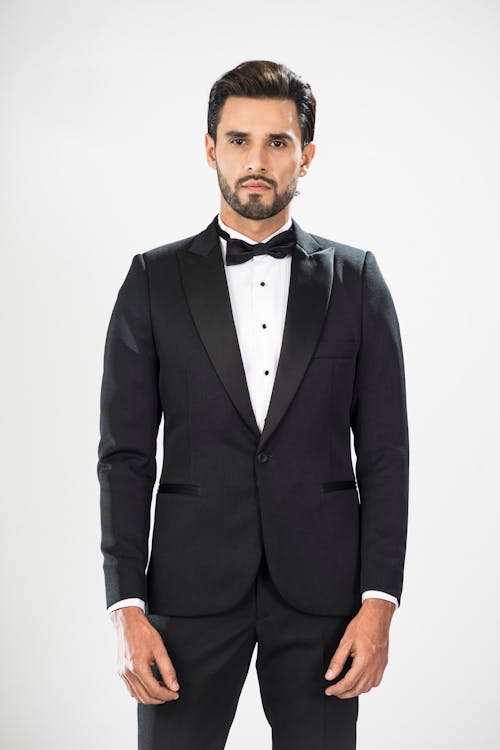 A Stylish Man Wearing a Black Suit 