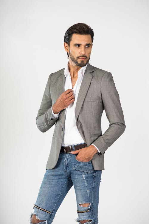 Man in Gray Suit Jacket Denim Pants