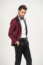 Man in Red Blazer and Black Pants