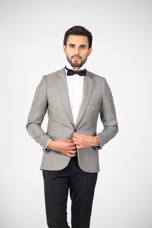 Free A Man in Gray Suit and Black Pants Stock Photo