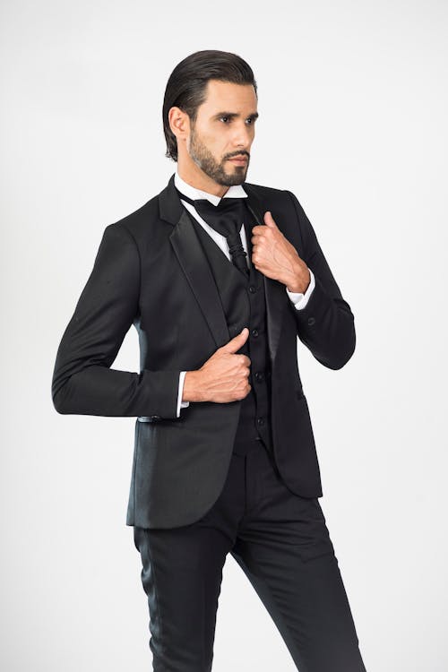 A Man in Black Suit and Black Pants · Free Stock Photo