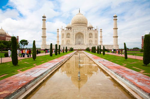 Amazing Taj Mahal Mausoleum under Cloudy Sky 