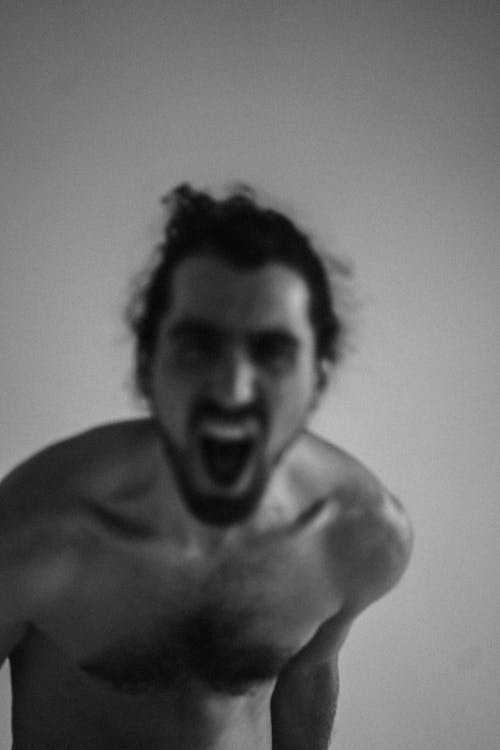 Free A Grayscale Photo of a Topless Man Stock Photo