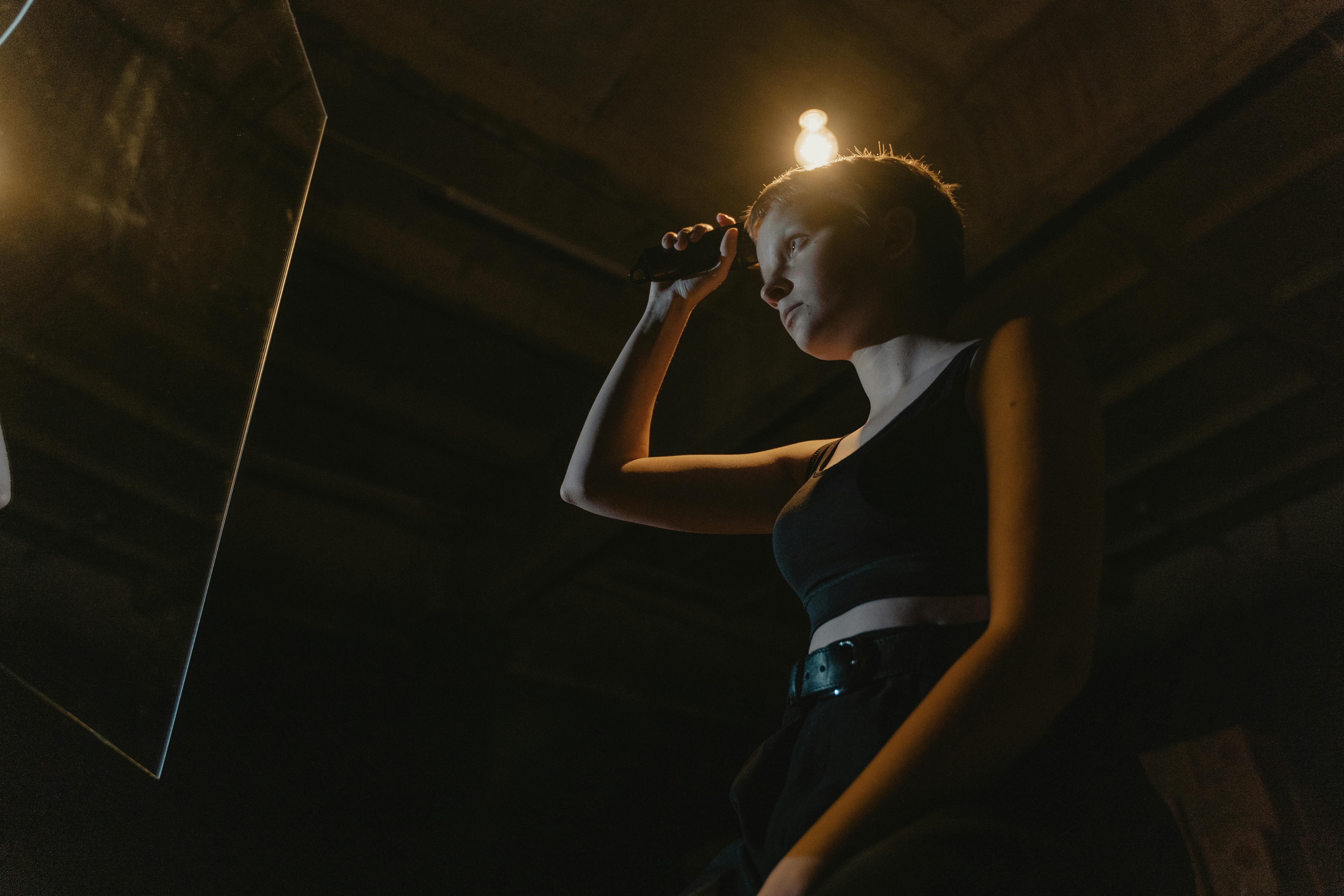 Dramatic low angle portrait with strong lighting
